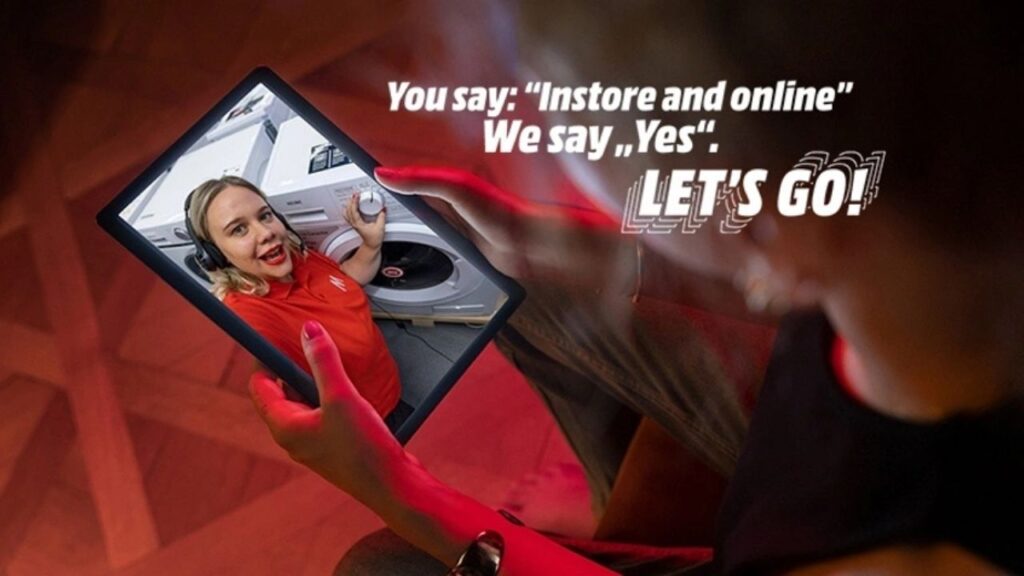 Mediamarkt ein Tablet mit einer Frau und einer Waschmaschine